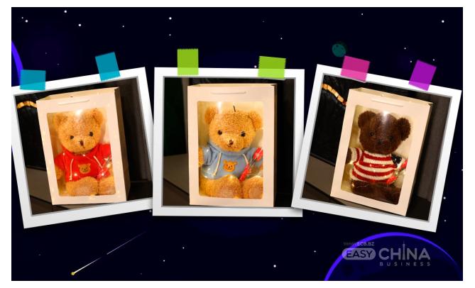 Фото товара Плюшевый мишка с цветком в подарочной коробке